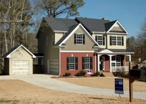 A spacious suburban house with a brick facade and attached garage.