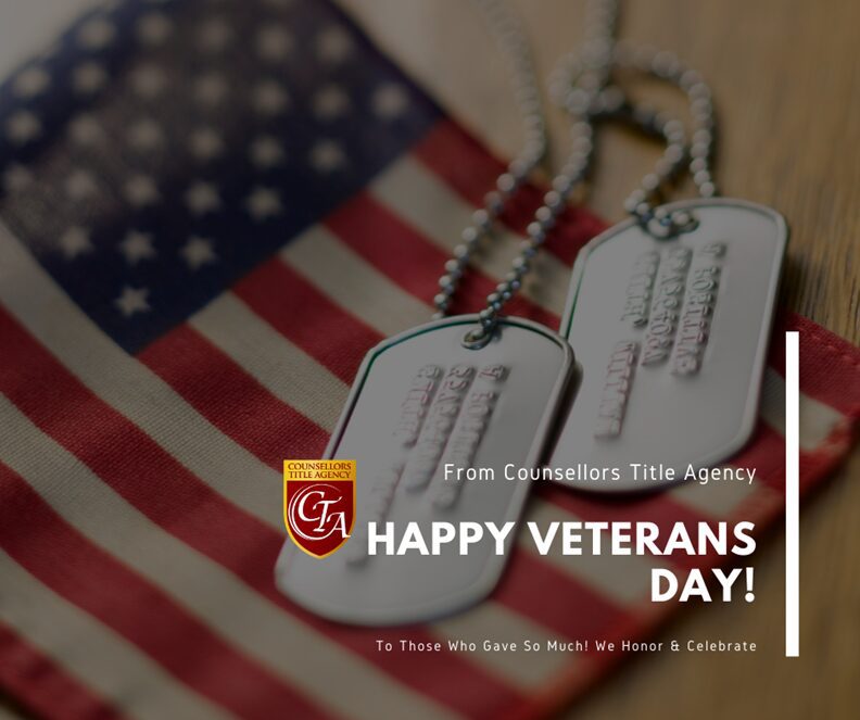 Dog tags on an American flag honoring Veterans Day.