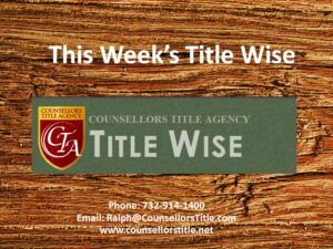 Logo and contact info of Title Wise on a wooden background.
