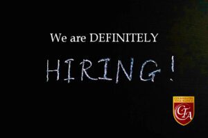 Black background with white text saying 'We are DEFINITELY HIRING!'.