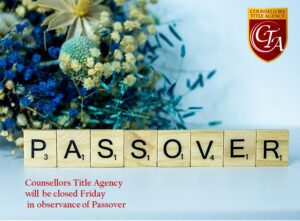 Scrabble tiles spell 'Passover' with flowers and a notice about agency closure.