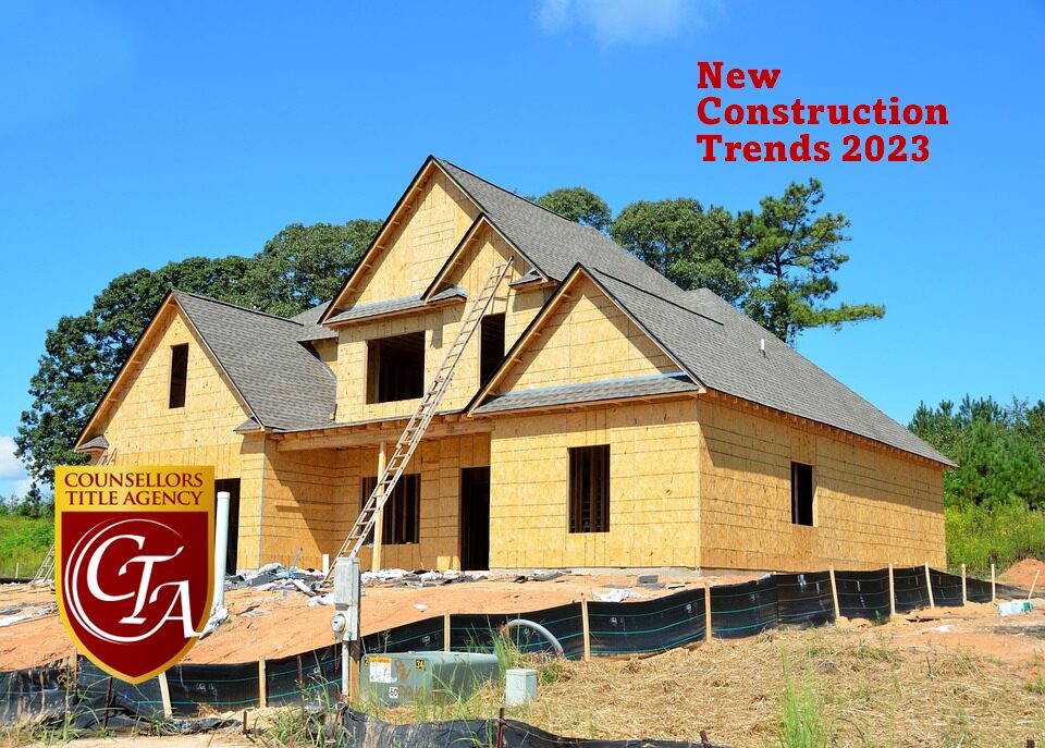 A new wooden house under construction with modern roofing.