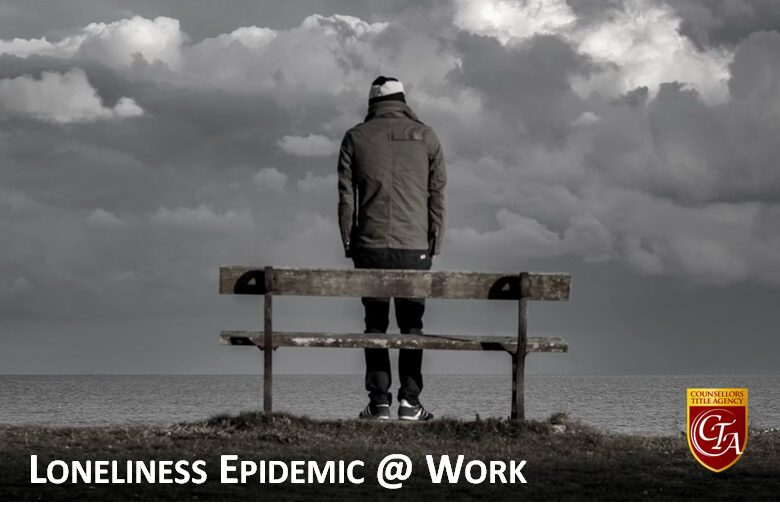 A person sitting alone on a bench, highlighting workplace loneliness.