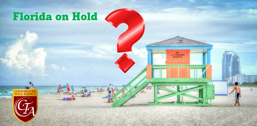 Beach scene with lifeguard stand, question mark.