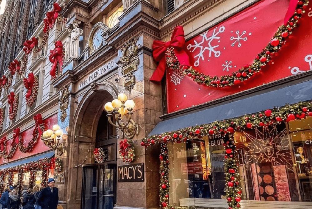 Festive department store with Christmas decorations displayed.