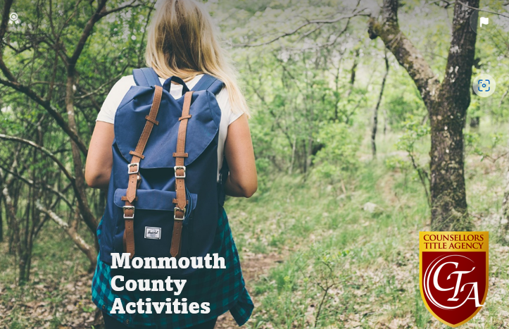 Woman hiking in Monmouth County forest trail.
