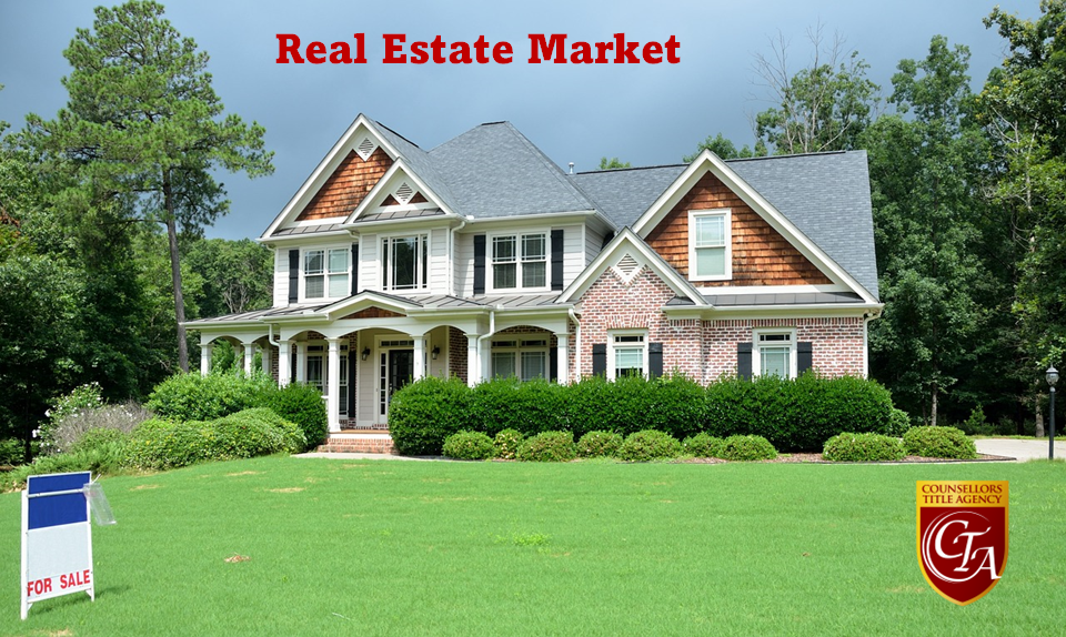 Suburban house for sale with green lawn.