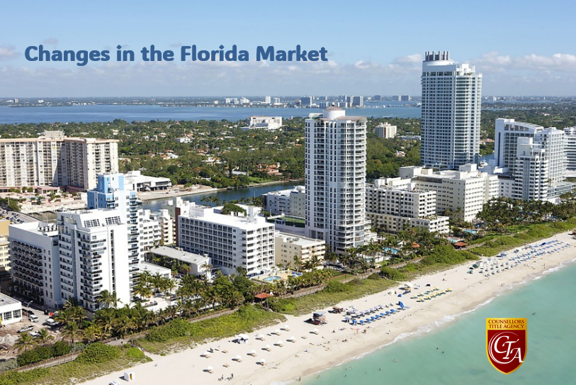 Florida beachfront cityscape with tall buildings.