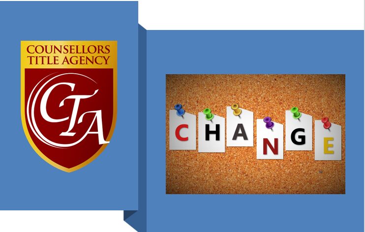 A corkboard with colorful letters spelling "CHANGE" and a real estate agency logo.