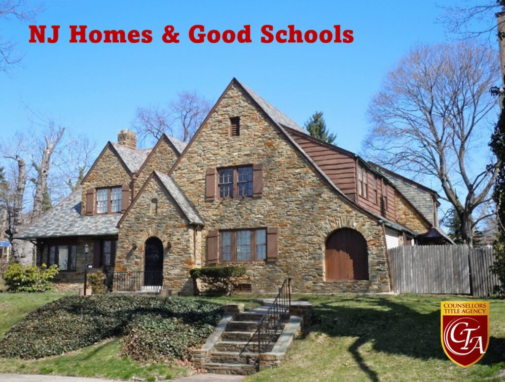 Stone house with steep roof promoting homes and good schools.