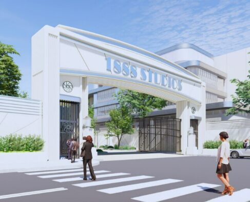 Studio entrance with people crossing street.